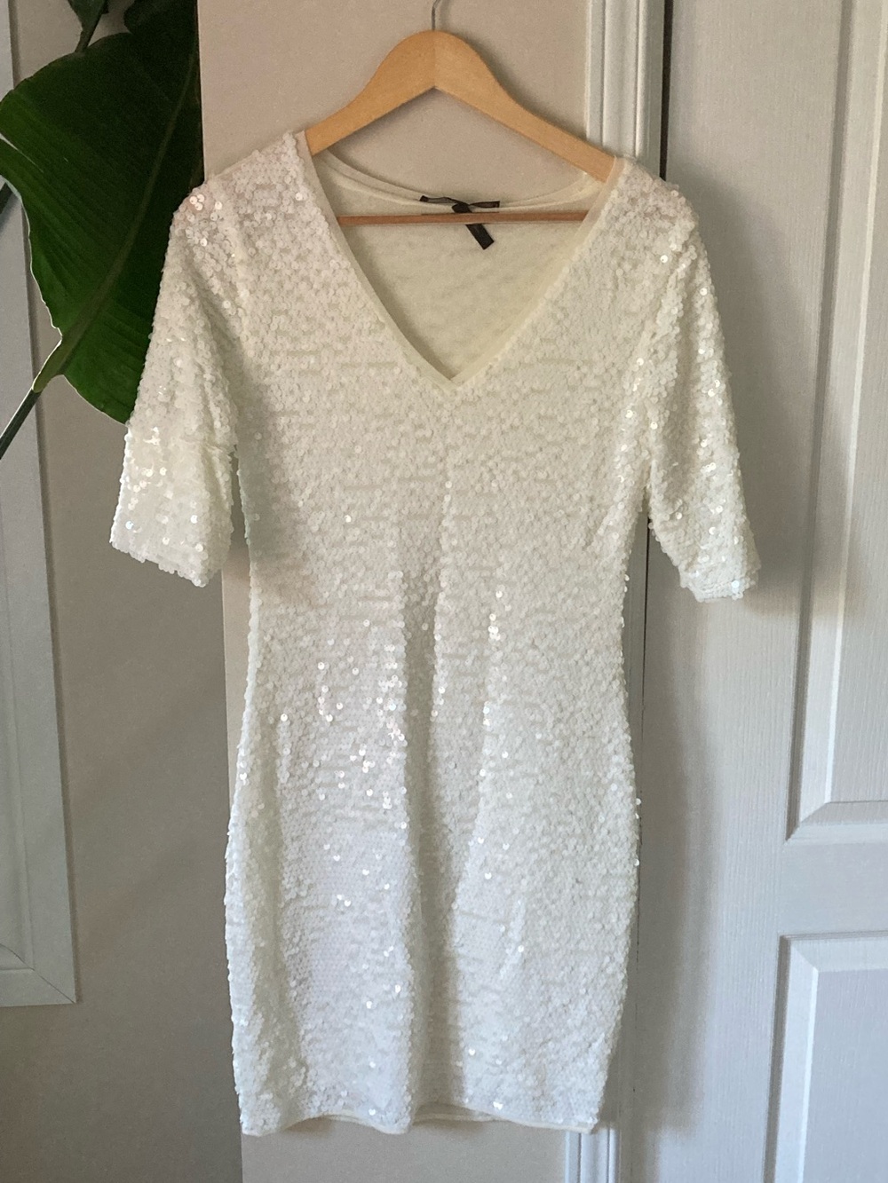 BCBGMAXAZARIA white sequin v-neck dress.
